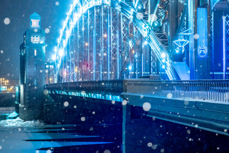 Saint Petersburg. Russia. Winter. Bolsheokhtinsky bridge. Bridges of St. Petersburg. Snowfall. The...