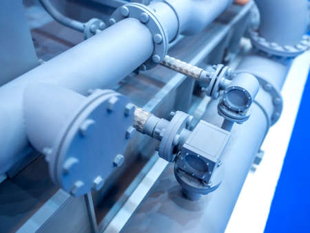Industrial concept with pipes. Fragment of production. Gray pipes.の写真素材