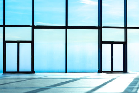 Spacious room with panoramic windows. Modern office interior. Space for business. Office rental....