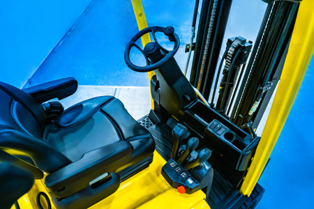 Electric loader. Stacker. Reach truck. Loading and unloading works in a warehouse. Loading equipment...