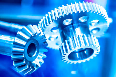 Metal gears. Industrial metal products. Milling work. Industrial background. Gear wheel close-up.の写真素材