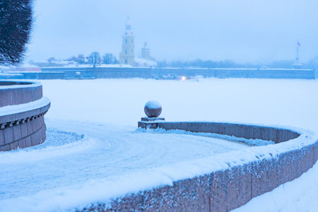 Saint Petersburg. Russia. Spit of Vasilyevsky Island. Fog. Peter and Paul Fortress in winter....
