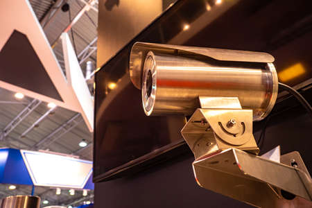 Vandal-proof video camera. Video monitoring. Video surveillance at the enterprise. Surveillance camera with night video function. Chamber under the ceiling of the enterprise. Safety in the enterpriseの写真素材