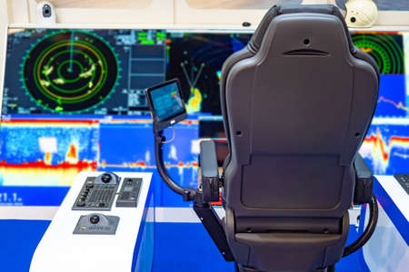 Captain's bridge. Boat control. Cabin control ship. Modern equipment on a yacht. The place of the captain of the ship. Electronics on the captainの写真素材