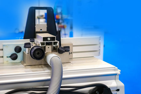 A piece of equipment woodworking shop. The workplace of a carpenter. Industrial vacuum cleaner for...