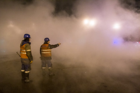 The accident on the pipeline. City in clouds of smoke from hot water. Evacuation of the transport from the danger zone. 22.01.2012のeditorial素材