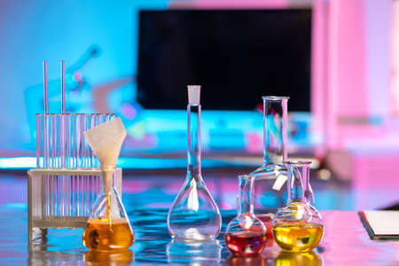 Laboratory glassware. Flasks for reagents are on the laboratory table.の写真素材