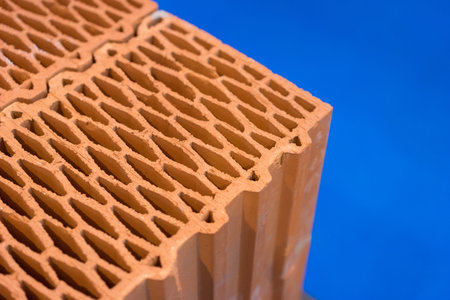 Large bricks. Construction of houses made of bricks. Construction Materials. Manufacture of building...