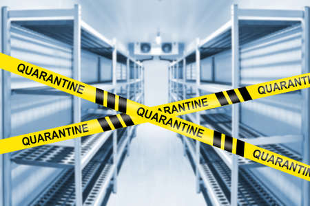 The warehouse is closed for quarantine. Coronavirus quarantine. Closure of enterprises due to an epidemic of a dangerous disease. Concept of medical quarantine. Prevention of diseases Covid-19.の写真素材