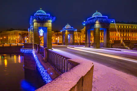 Saint Petersburg. Russia. Christmas Lomonosov bridge. Bridge across the Neva. Lomonosov bridge on New Year's Eve. Winter tours to Russia. Illuminations. Christmas decorations. Snow. Russia town.の写真素材
