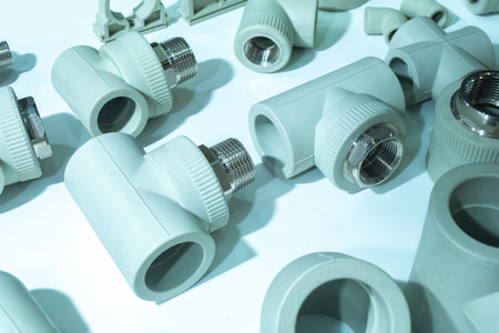 Polypropylene plumbing adapters. Combined couplings for connecting metal and polypropylene water...