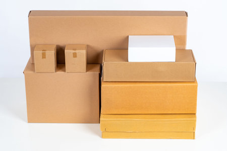 Cardboard boxes on a white background. Cardboard boxes of different sizes. Home delivery of goods....