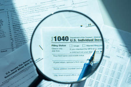 The Declaration for the individual income tax of the United States. Tax payment control. Taxation of individuals in the United States. The American tax system. Mandatory payments for American citizensの写真素材