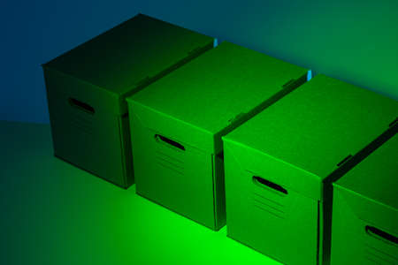 Eco-friendly packaging. Cardboard boxes with lids and handles. Boxes made of biodegradable materials. Boxes for transporting things.の写真素材