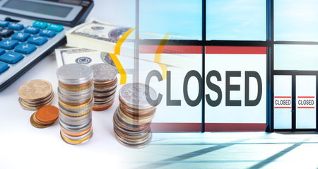 Closed signs are on the doors and Windows of the building. Closed office against the background of...
