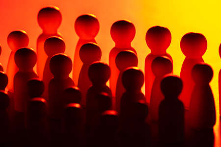 The concept of the state. Political parties or the army. The silhouettes of a multitude of faceless people. People without individual traits.の写真素材