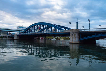 Travel to Tokyo. Bridges in Tokyo. The Island Of Odaiba. Sumida Prefecture, Japan. Calm city landscape with a bridge. Boat trips in Tokyo. Travel to Japan.の写真素材