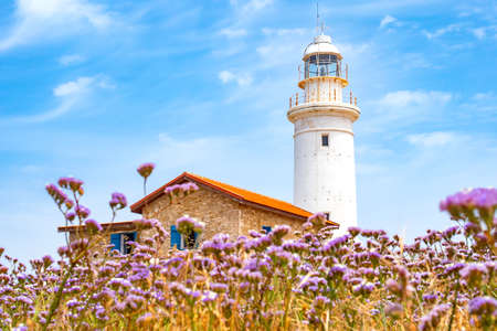 Cyprus. Pathos. Archaeological Park of Paphos. Paphos lighthouse on the Mediterranean coast. Lighthouse and caretaker's house. Cyprian archaeological memorial. Sightseeing Cyprus. Travel to Cyprus.の写真素材