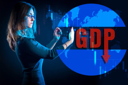Girl on the background of the world map and GDP inscription with a down arrow. Analysis of...
