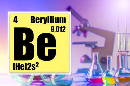 Be. Beryllium data from the periodic table of Mendeleev against the background of chemical laboratory equipment. The use of beryllium in manufacturing. Highly toxic metal.の写真素材