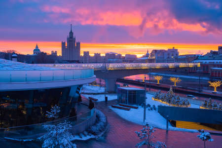 Winter journey through the Moscow. New year in the capital of Russia. Dawn in Moscow. Moscow streets are decorated for Christmas. Christmas street lights and colorful sky. New year Russian capital.の写真素材