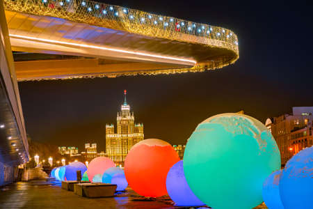 A festive evening in Moscow. Decorations of multicolored glowing balls in the center of Moscow. The Russian capital is decorated for Christmas. New year in Moscow. Street decorations for the New year.の写真素材