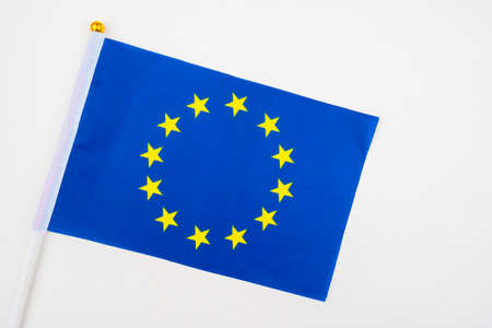 Flag of the European Union on a white background. The flag of the EU. Flag with yellow stars on a blue background. Banner Of Europe. Official symbol of the Union of European countries.の写真素材