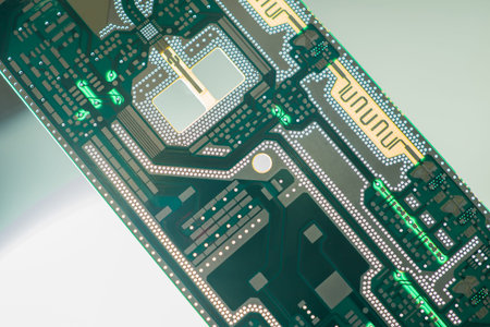 Printed circuit Board lies diagonally on the table. Gray-green background of a printed circuit Board...