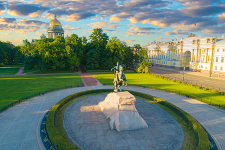 Bronze horseman and St. Isaac Cathedral against the beautiful sky. Sights Of Saint-Petersburg. Russian city in summer. Beautiful sky over the monument to Peter the Great. St. Petersburg poster.のeditorial素材