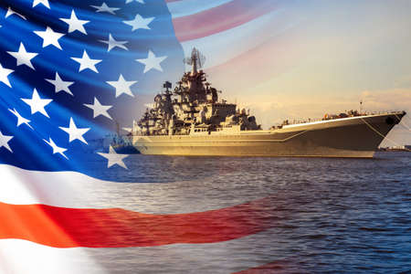 The Navy of the United States of America. Warship on the background of the American flag. Protection of the state's Maritime borders. Participation in armed conflicts on the water.の写真素材