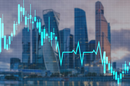Falling graph on the background of skyscrapers. Falling chart as a symbol of the economic situation....