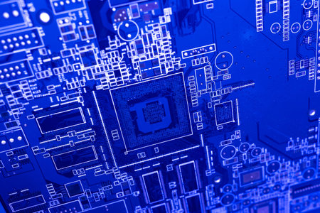 PCB background. PCB in blue neon light. Microchip close-up. PCB background with white lines. Texture...
