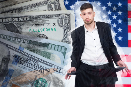 American was left without money. Guy shows empty pockets. Empty pockets as a symbol of bankruptcy....
