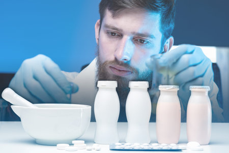 Preparation of prescription drugs. Doctor mixes medicine and packs it bottles. Doctor creates a...