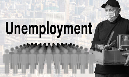 Man replenished number of unemployed. Inscription unemployment next to a man. Human in a medical mask was fired. Concept - massive layoffs due to pandemic. Fever caused by job cuts. Box in his handsの写真素材