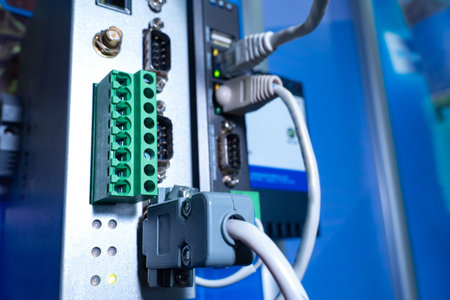 Input module on production equipment. Panel with connectors for cables close-up. Electronic...