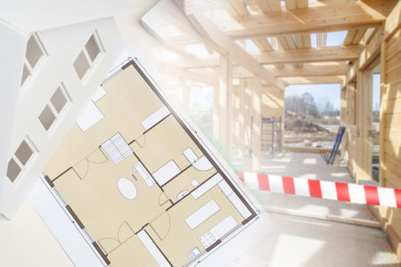 Construction has been discontinued due to non-compliance with plan. Tape symbolizes a construction stop. Drawings rooms. Layout house. Concept - construction stopped due to an architect's mistake.の写真素材