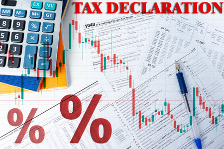 Falling chart next to the declarations. Tax inspector desk top view. Papers with tax returns are on the table. Concept - falling tax flow. Form 1040 next to the calculator. Profit reductionの写真素材