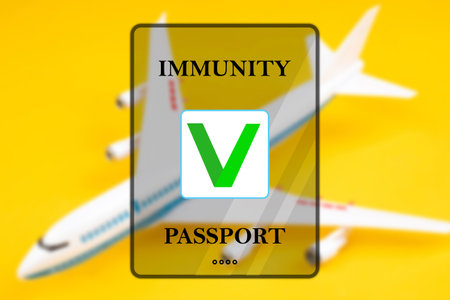 Logo of the immune passport on the plane background. Proof of immunity to the virus for travel. Certificate confirming the presence of antibodies.の写真素材