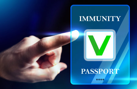 Person puts his finger to the Immune passport label.