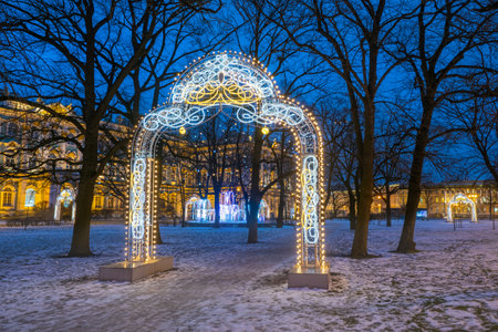 Saint-Petersburg on Christmas eve. New year in Russia. Christmas decorations on Petersburg street. Luminous arches and fountains made of garlands in the center of Petersburg. Decorations in the city.の写真素材