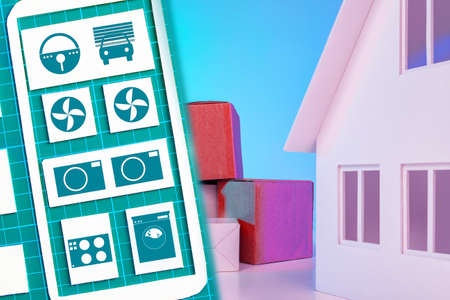 Abstract Smart Home mobile app next to the cottage layout. Home automation system labels on the background of the home layout. Internet of Smart Things.の写真素材