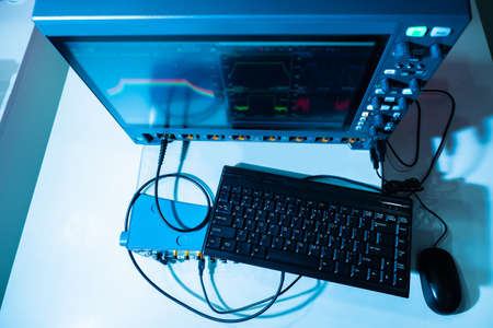 Modern electronic equipment. Measuring instrument in the laboratory. Measurement and data collection in a scientific laboratory. Equipment with measuring devices. Scientific Research and development.の写真素材