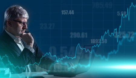 Analyst on the background of figures and graphs. A man analyzes the market situation. The dynamics...