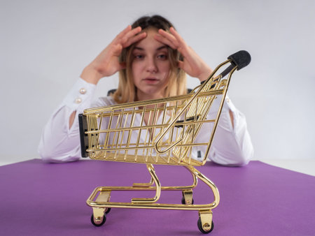 Miniature shopping basket as a symbol of diminishing purchasing power. Loss of purchasing power....