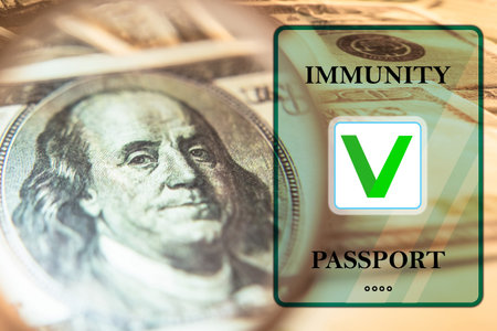 Image of immunity passport on a US dollar background. Passport confirming immunity