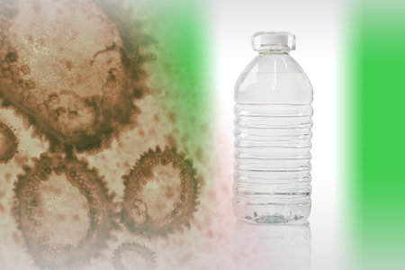 A bottle of water next to bacteria. Concept - the disappearance of water from the shelves. Loss of...