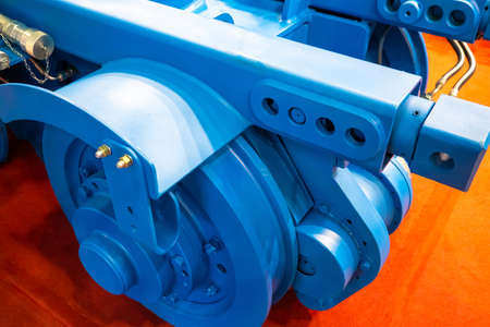 Fragment of a wagon or trailer close-up. Blue trailer from some equipment. Fragment of slipway cart. Manufacture and sale of slipway carts. Concept - equipment for shipbuilding. Cart for transportingの写真素材