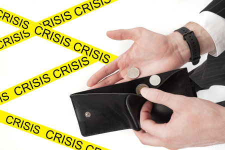 Empty wallet in hand. Man demonstrates his empty wallet. Empty wallet as a symbol of poverty. Man in...