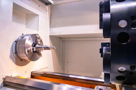 CNC control equipment. Computer-controlled production equipment. This machine is computer-controlled. Numerical programmed control of zovod equipment. Fragment of a milling machine.の写真素材